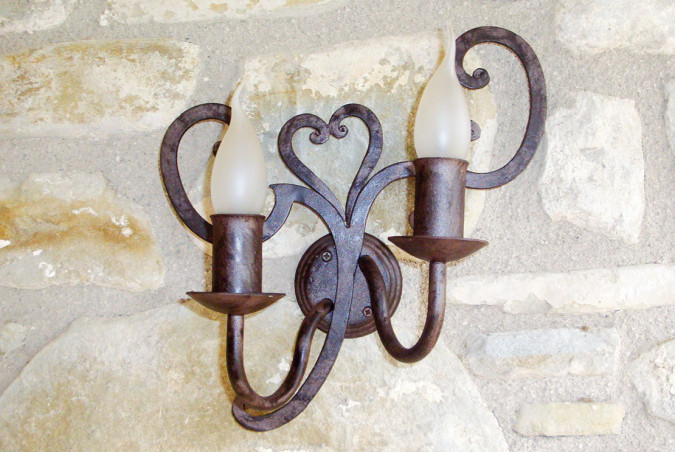 Hand-forged wrought iron two-light applique for interiors - Buy Fiordaliso lamp by Artigianfer Spello