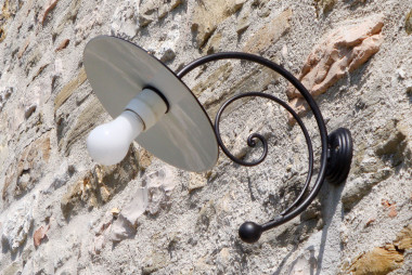 Handmade wrought iron wall lamp with pastoral curved arm - Buy Impero by Artigianfer Spello Italy