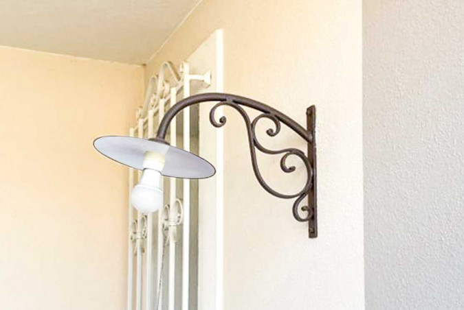 Outdoor wall lamp in hand-forged wrought iron with curls - Buy Pompei by Artigianfer Spello Italy