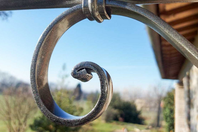 Hand-forged wrought iron outdoor long arm wall light with double swirl workmanship - Buy Este by Artigianfer Spello Italy