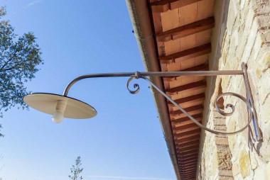 Hand-forged wrought iron outdoor long arm wall light with double swirl workmanship - Buy Este by Artigianfer Spello Italy