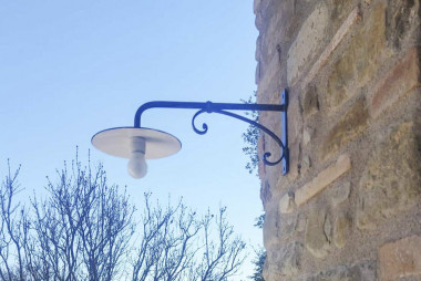 Wrought iron outdoor wall arm light forged and worked entirely by hand - Buy Tivoli by Artigianfer Spello Italy
