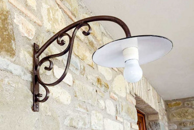 Outdoor wall lamp in hand-forged wrought iron with curls - Buy Pompei by Artigianfer Spello Italy