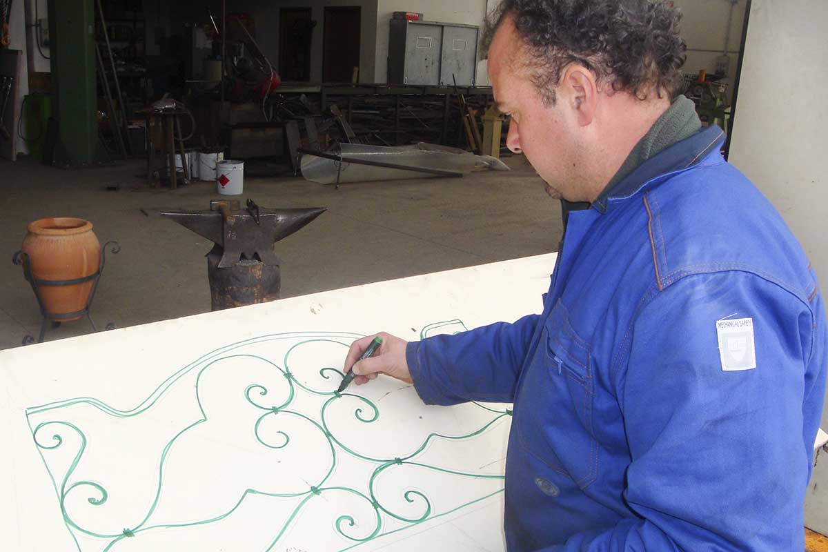 Wrought iron: the processing always begins with the creation of the sketch - Artigianfer Spello Umbria Italy