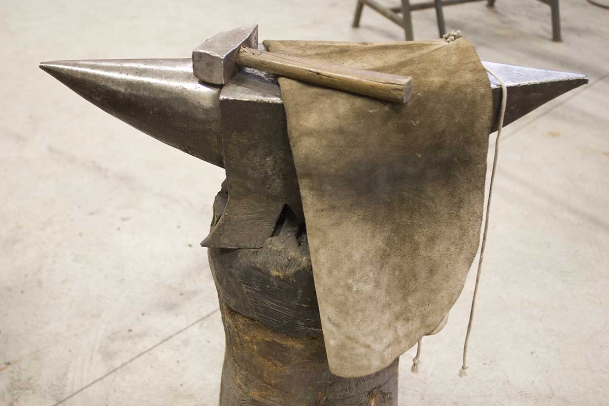 Wrought iron: anvil, mallet, and hammer. The tools of the artisan blacksmith - Artigianfer Spello Umbria Italy